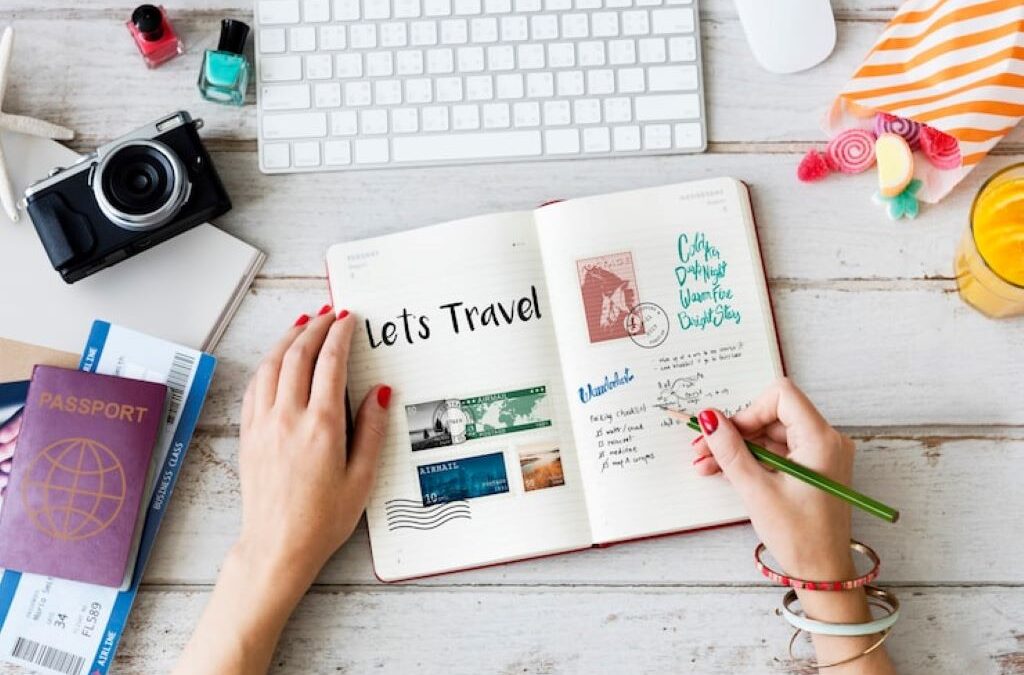 Person editing travel videos and organizing digital memories on a laptop